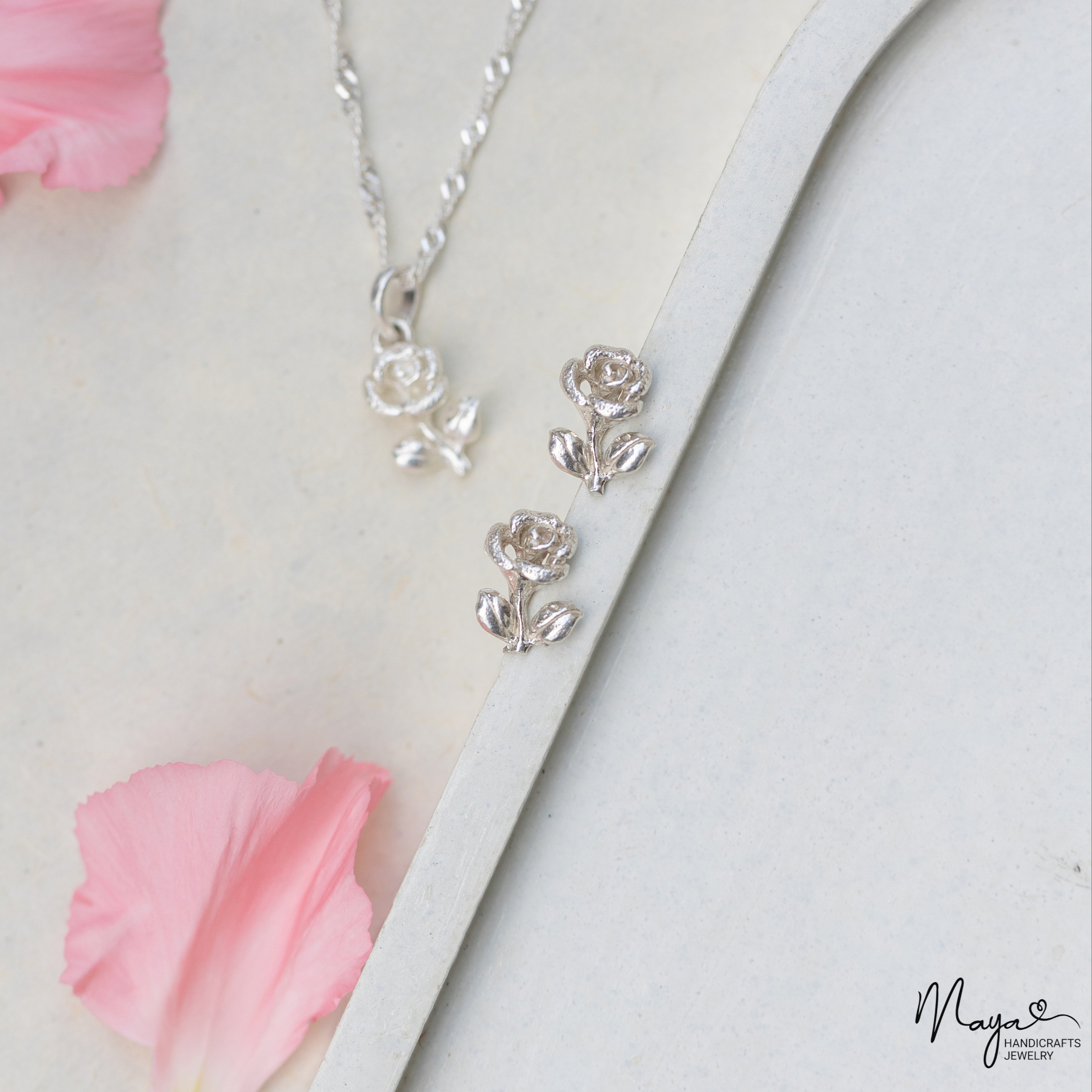 Rose with leaf studs